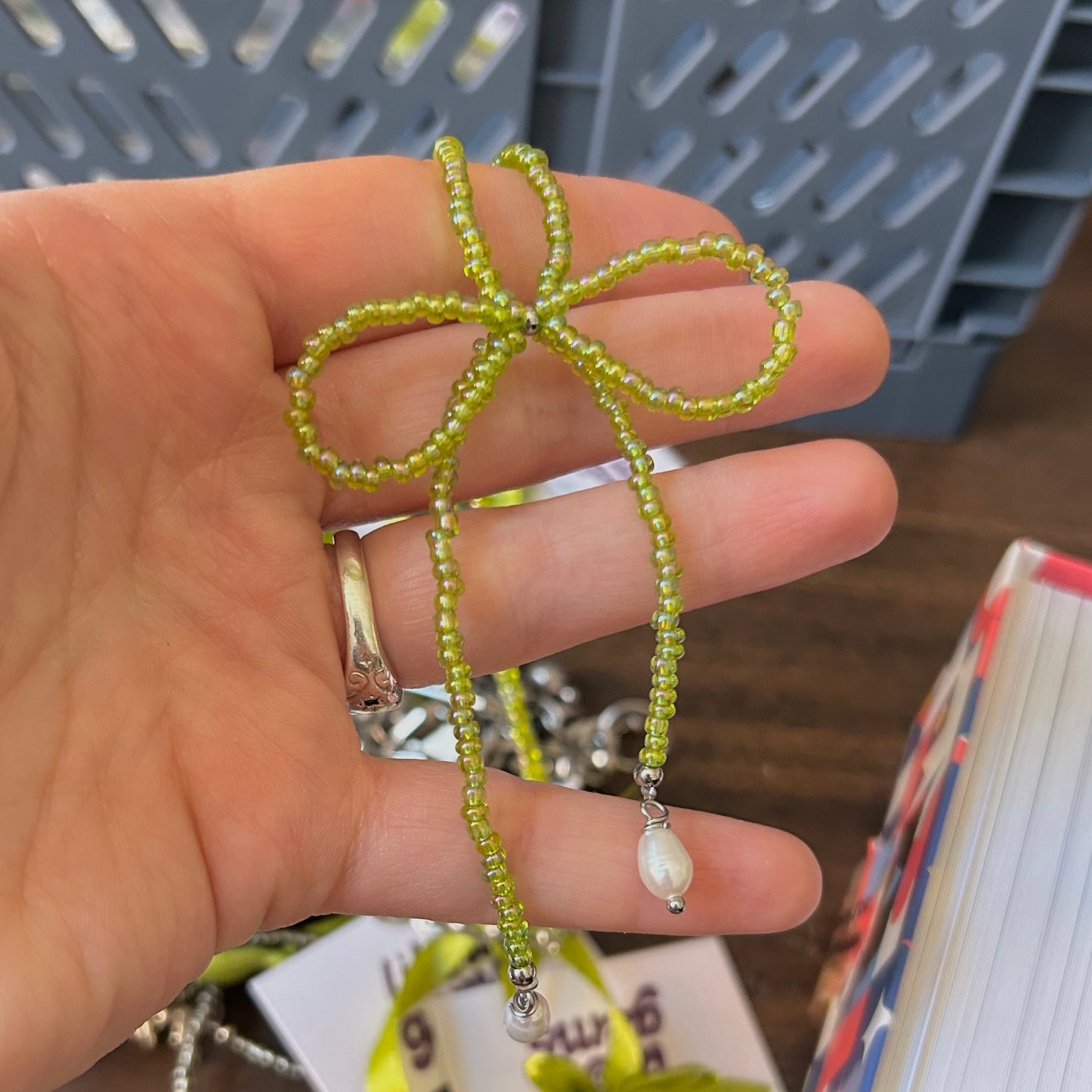 BEADED BOW NECKLACE